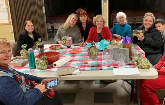 photo of ladies in a support group sitting around a table